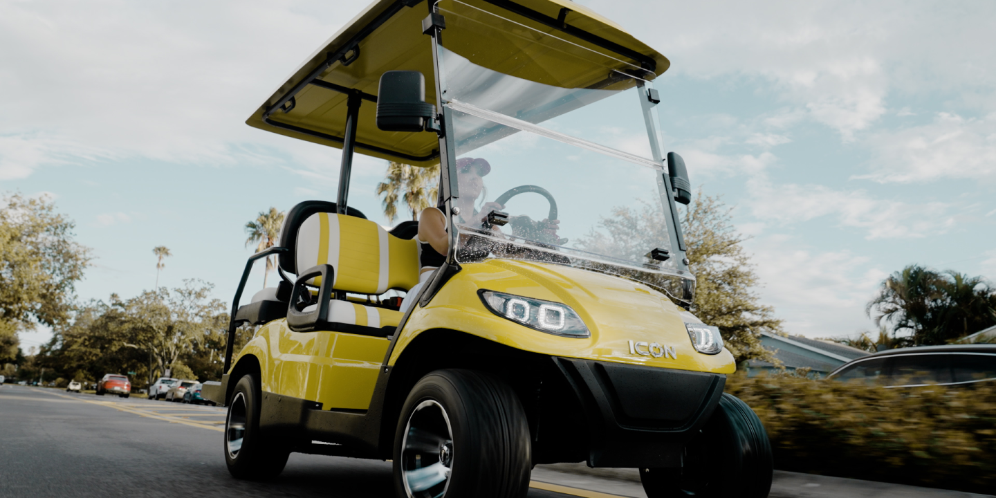 yellow golf cart at an angle